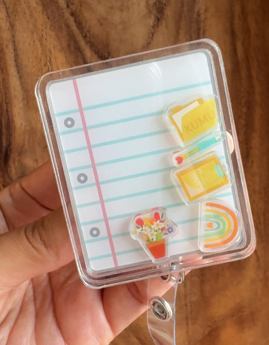 Kumu Binder Shaker Badge Reel